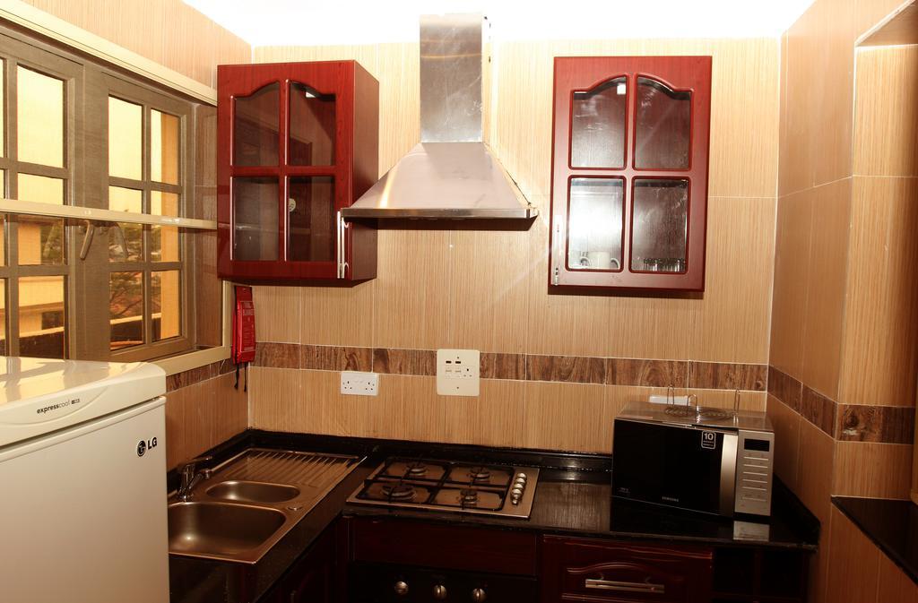 Apartment Royale Hotel & Suite Lagos Oda fotoğraf